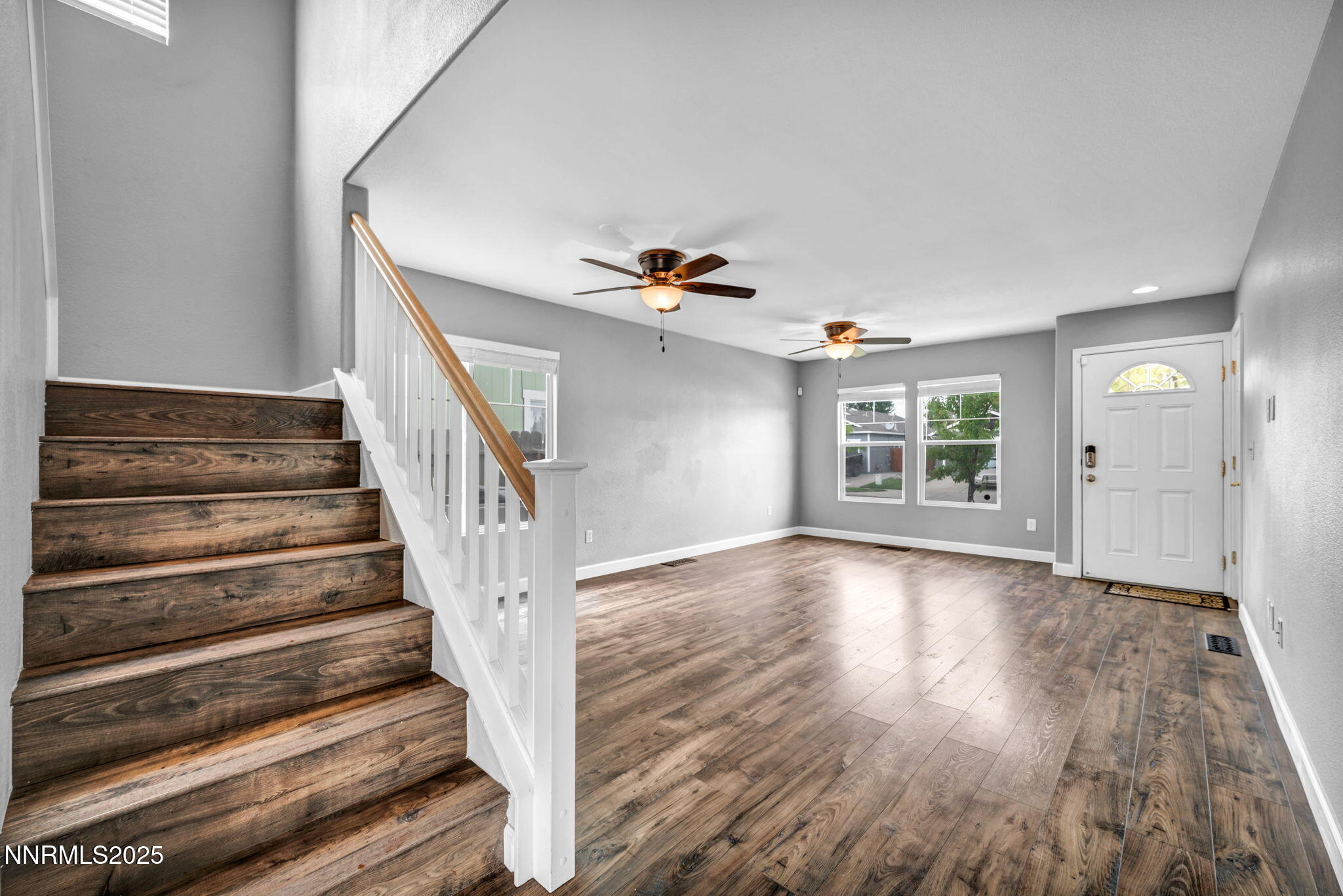 7644 Corso Street Reno, NV 89506 - Photo 50 of 54 a view of entryway and hall with wooden floor