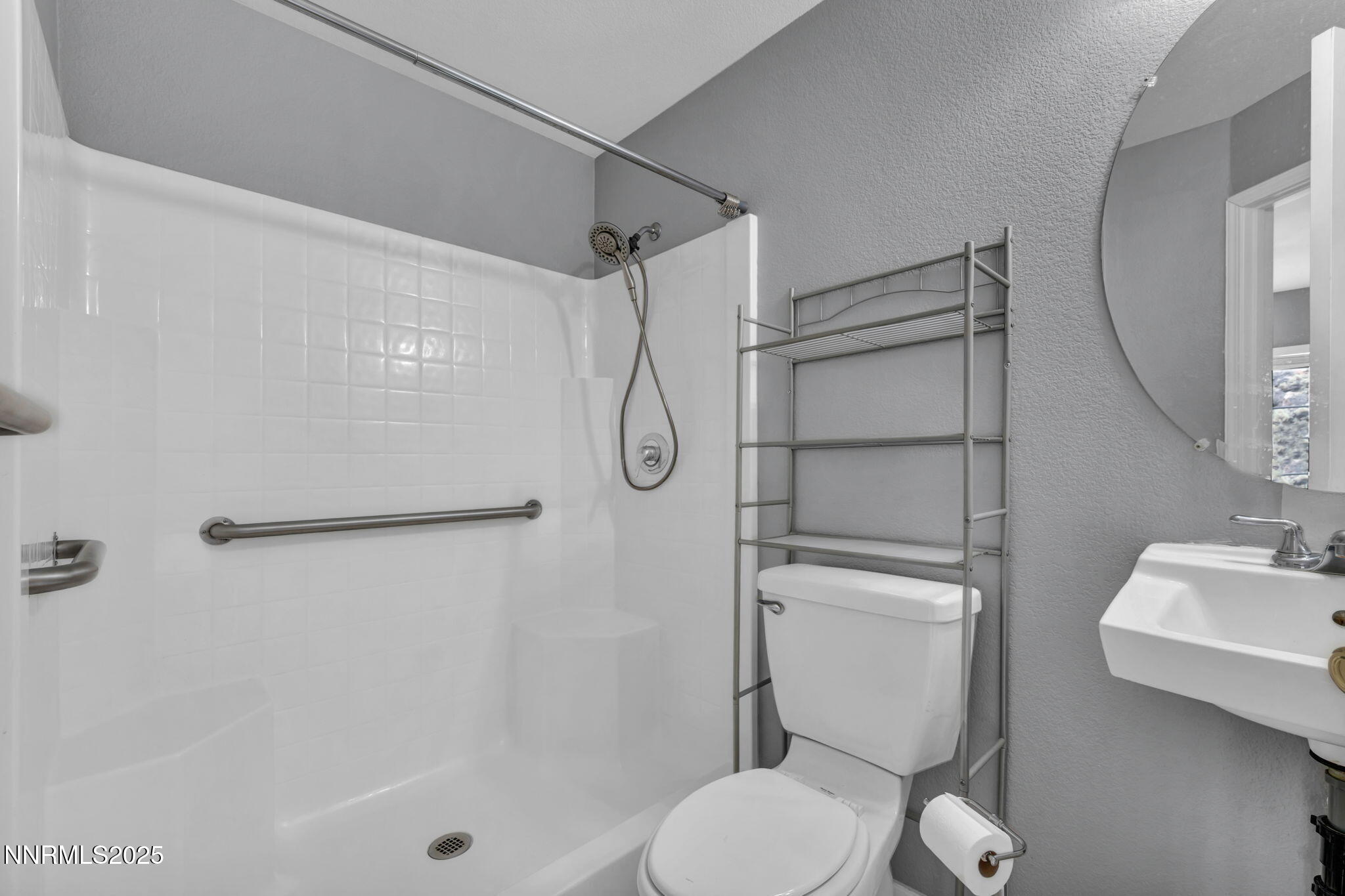 7644 Corso Street Reno, NV 89506 - Photo 53 of 54 a bathroom with a toilet and a shower