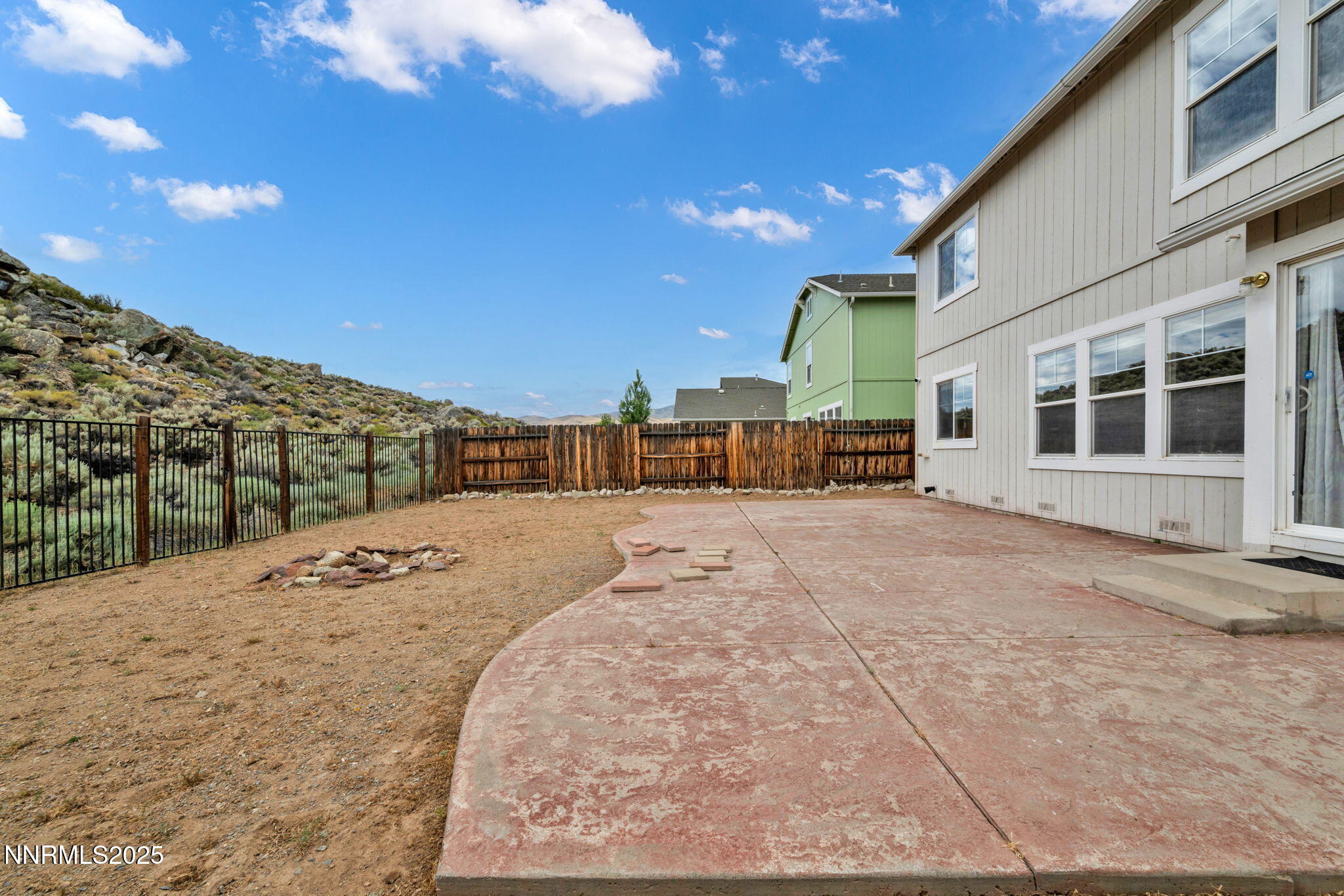 7644 Corso Street Reno, NV 89506 - Photo 9 of 54 a view of a house with a snow