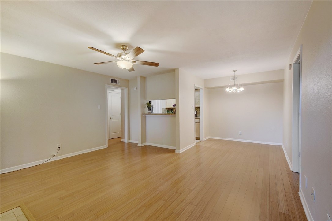 3204 Manchaca Road, Unit 105 Austin, TX 78704 - Photo 1 of 1 a view of an empty room with a ceiling fan
