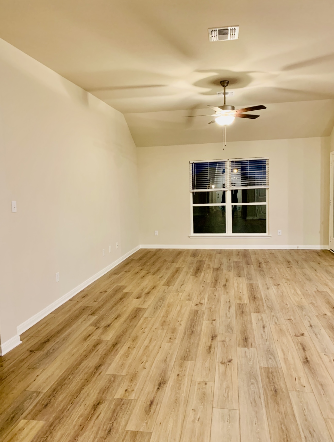 808 Fallbrook Drive Temple, TX 76502 - Photo 7 of 36 Spare room featuring light wood-style flooring, ceiling fan, and vaulted ceiling