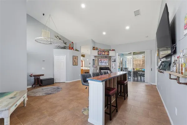 a kitchen with sink cabinets and outdoor living room