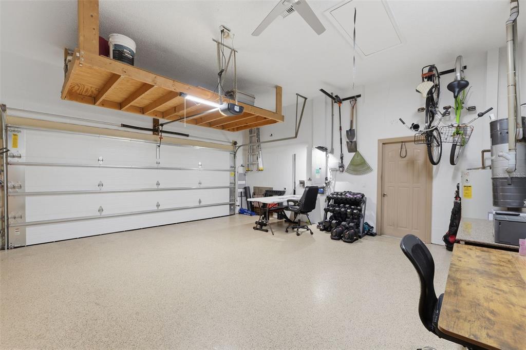 7442 Aloe Drive Spring Hill, FL 34607 - Photo 39 of 59 a view of a room with gym equipment