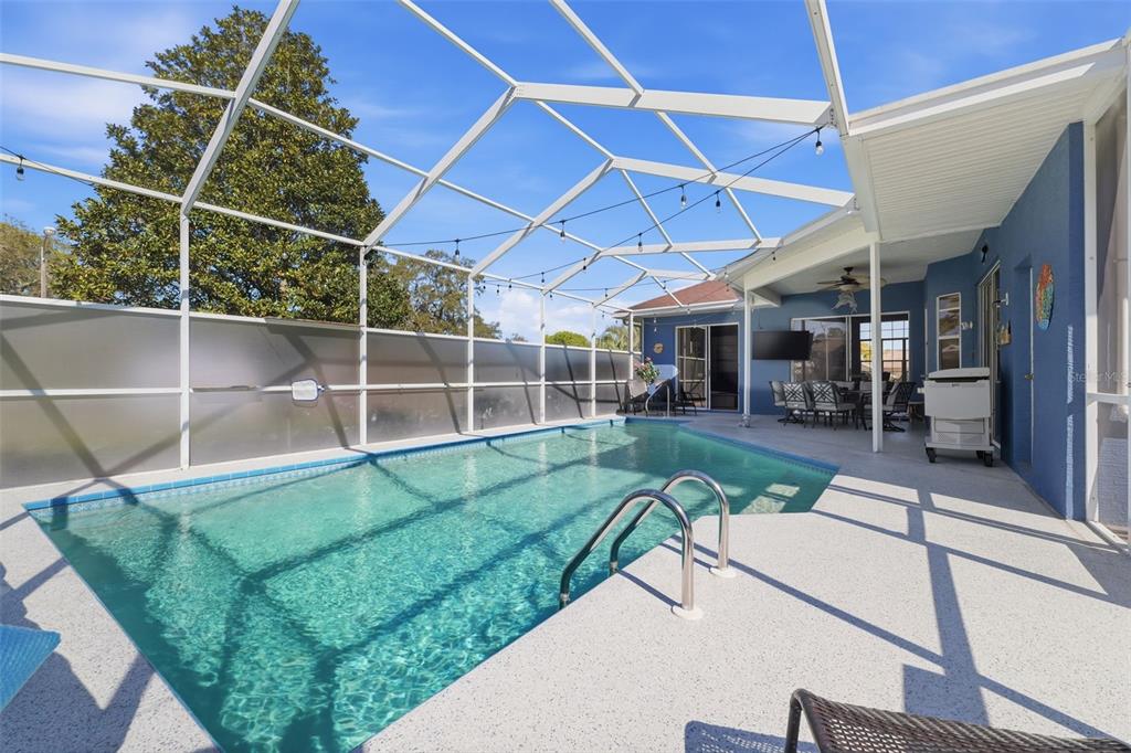7442 Aloe Drive Spring Hill, FL 34607 - Photo 44 of 59 a view of a backyard with a porch