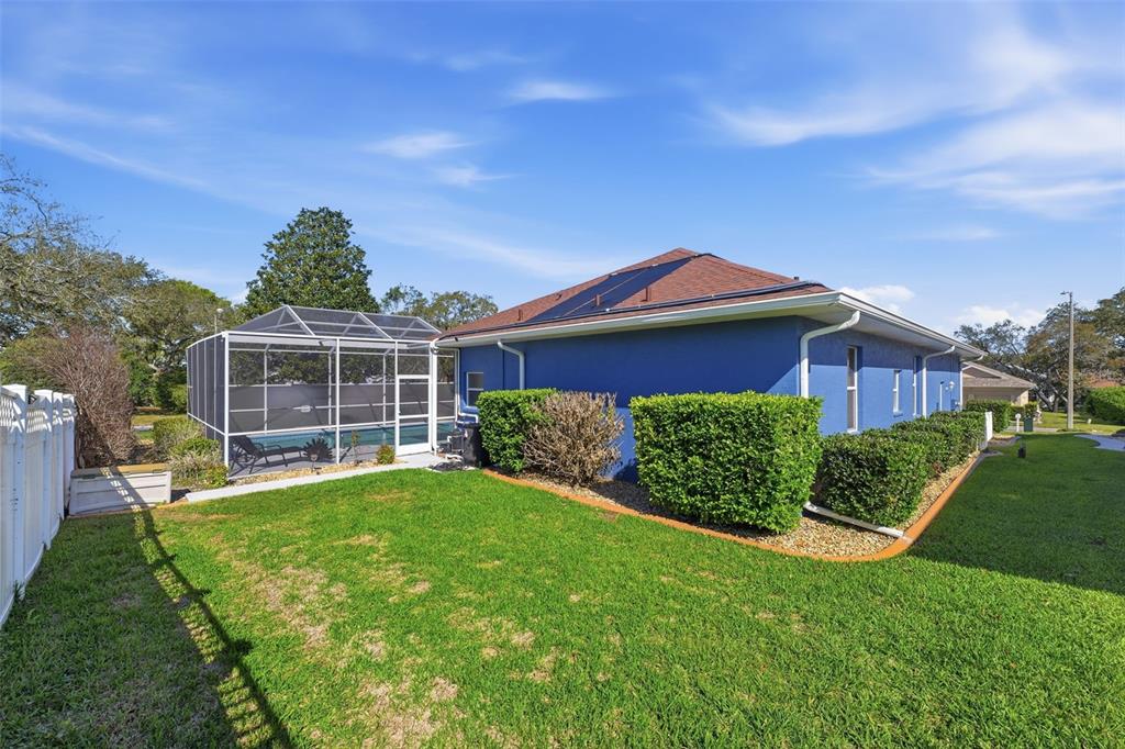 7442 Aloe Drive Spring Hill, FL 34607 - Photo 47 of 59 a front view of a house with a yard