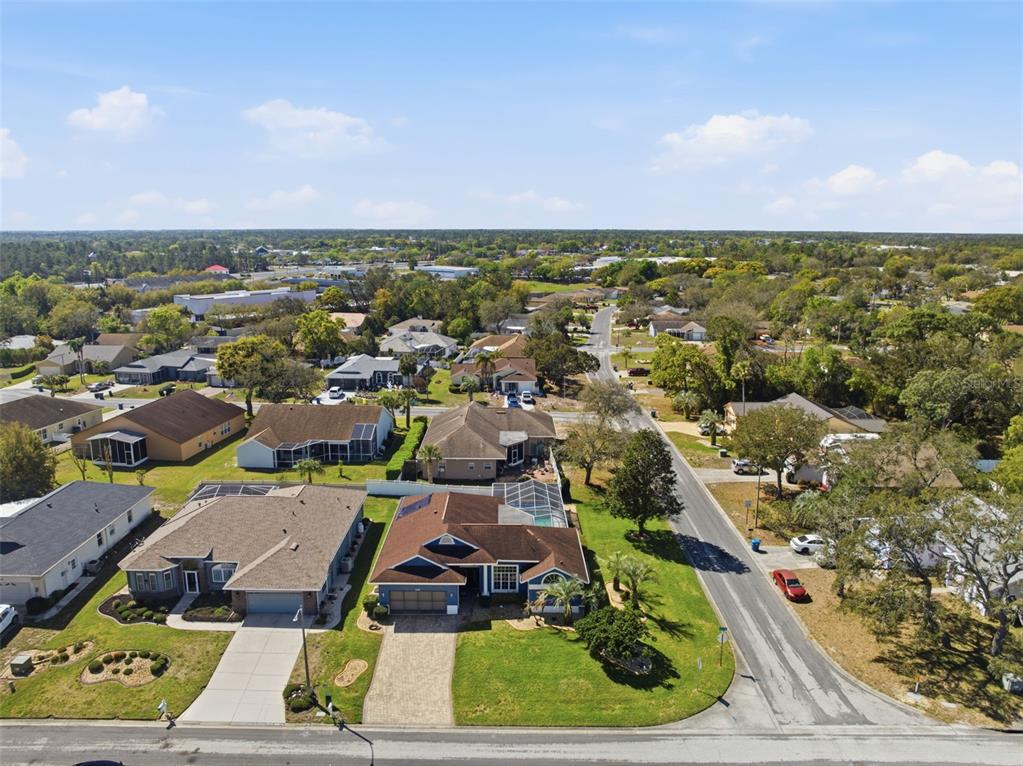 7442 Aloe Drive Spring Hill, FL 34607 - Photo 58 of 59 an aerial view of residential houses with outdoor space and street view