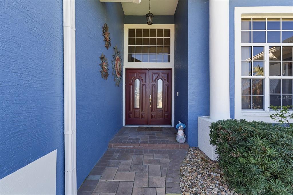 7442 Aloe Drive Spring Hill, FL 34607 - Photo 7 of 59 a view of front door of a house