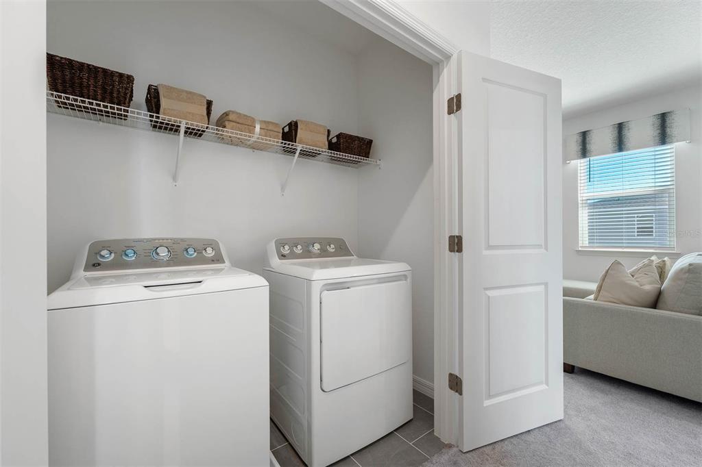 1808 Shadow Box Bend St. Cloud, FL 34771 - Photo 30 of 40 a utility room with dryer and washer