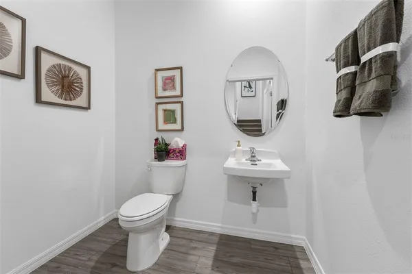 a bathroom with a toilet and a sink