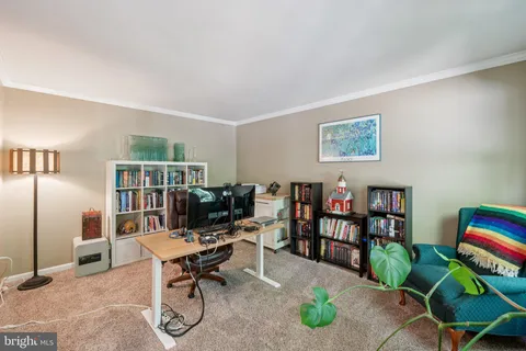 a view of a livingroom with furniture and toys