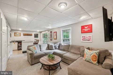 a living room with furniture and a table
