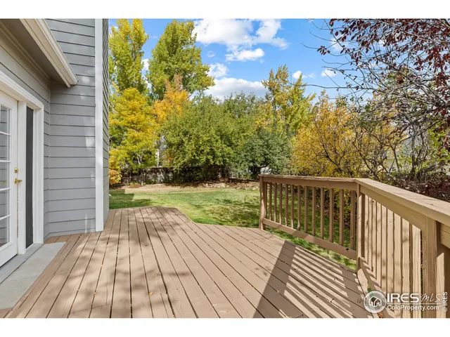 a view of balcony with wooden floor