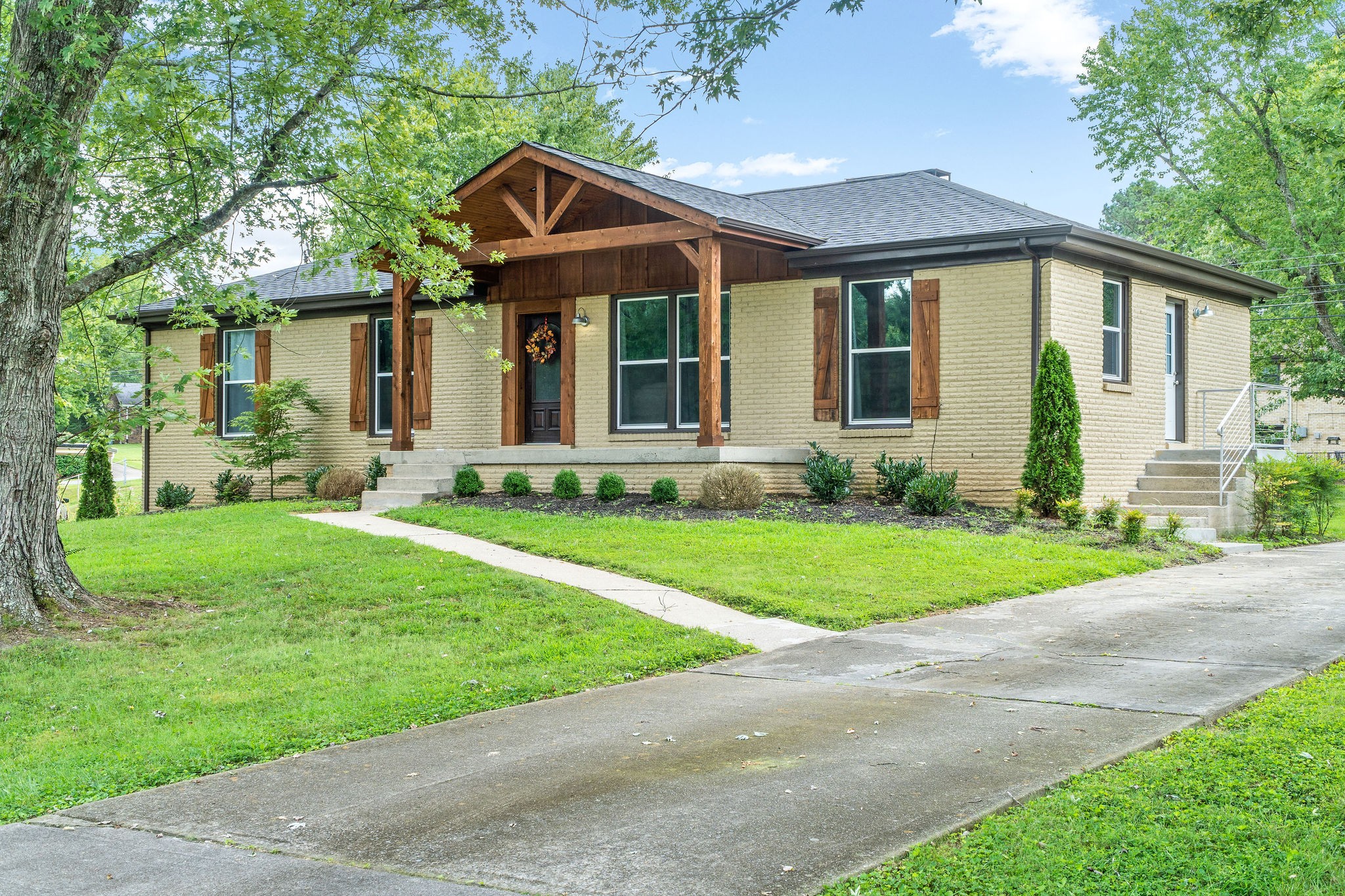 2158 Post Road Clarksville, TN 37043 - Photo 1 of 30 a front view of a house with a yard and porch