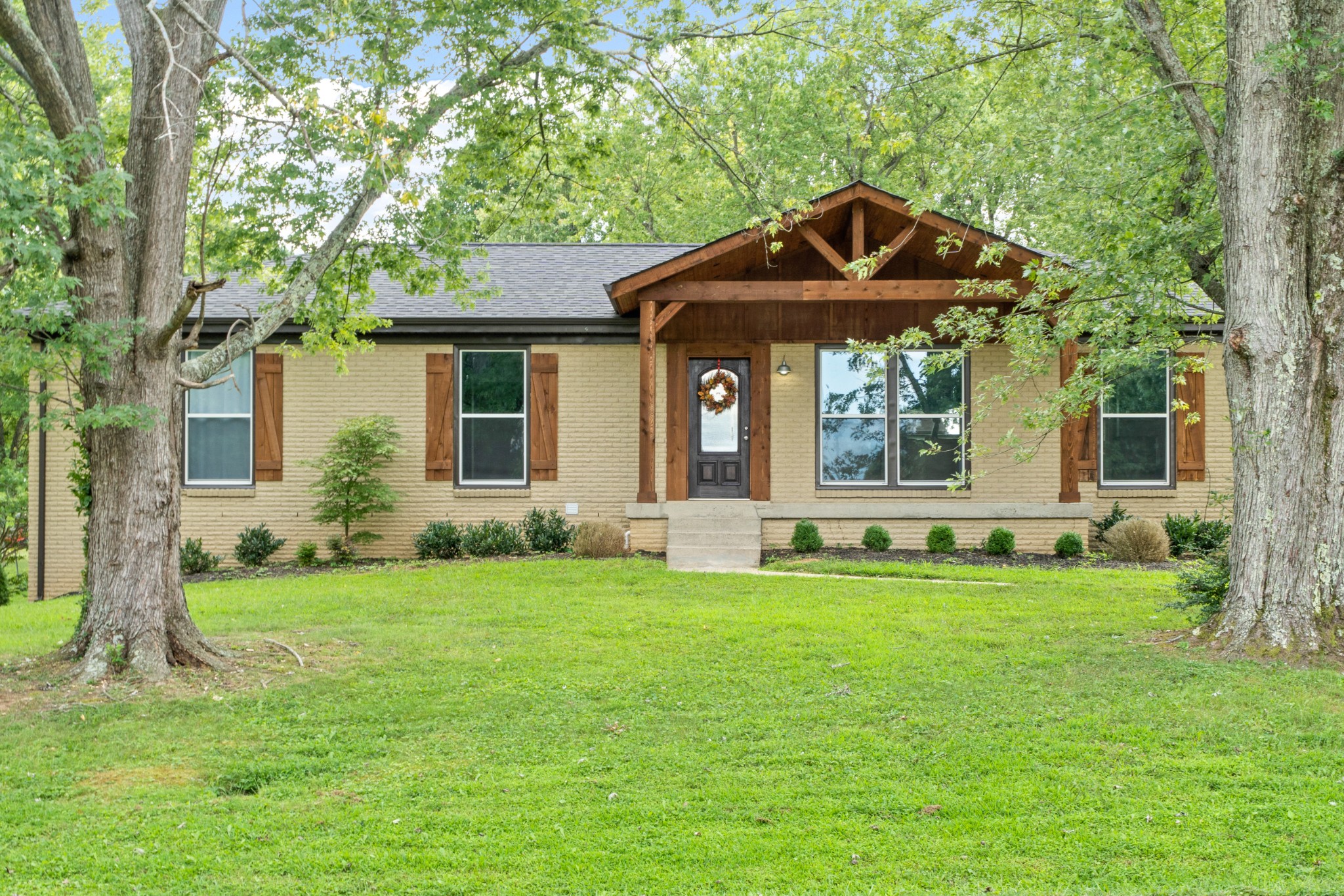 2158 Post Road Clarksville, TN 37043 - Photo 2 of 30 a front view of a house with a garden