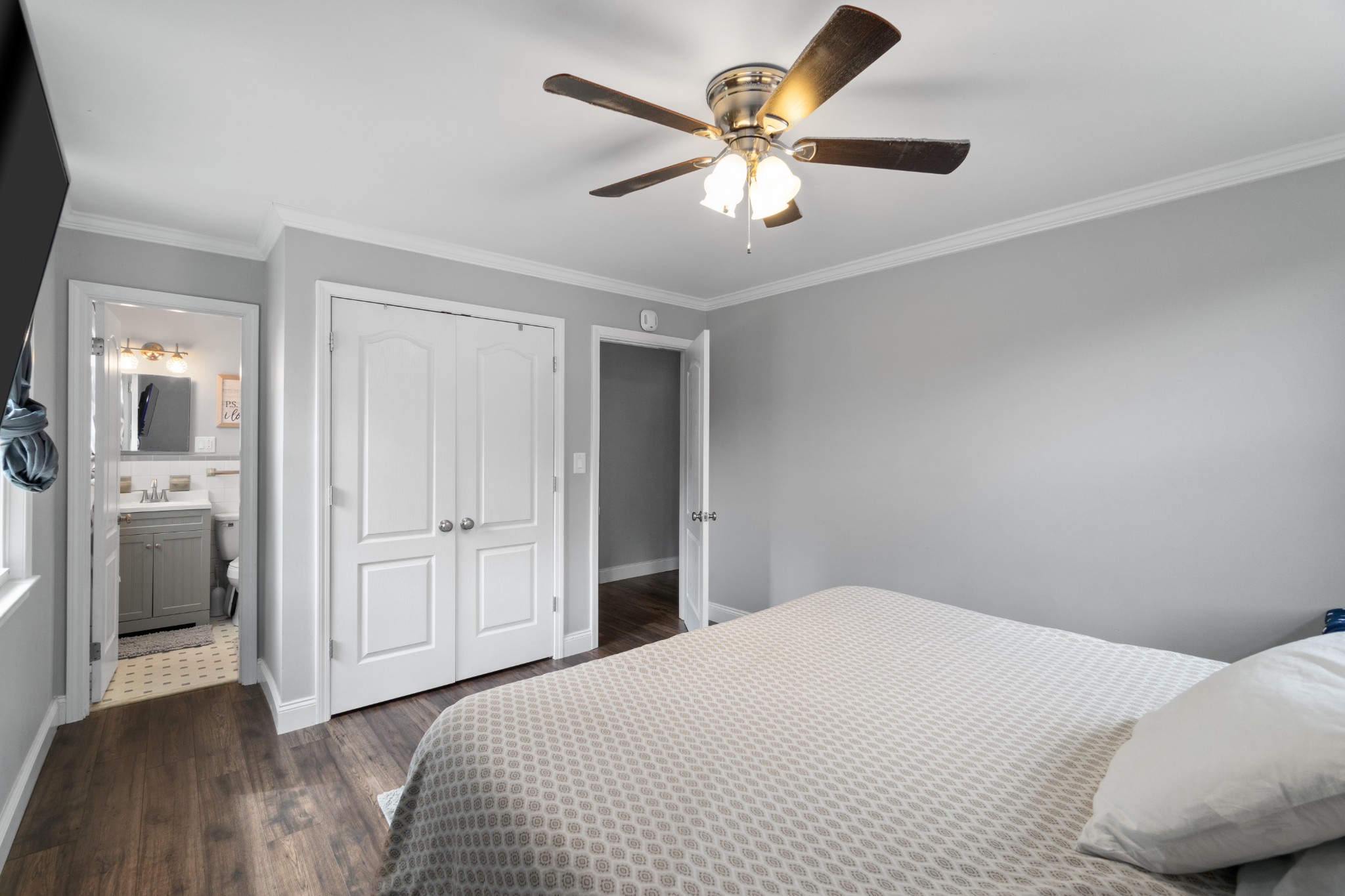 2158 Post Road Clarksville, TN 37043 - Photo 19 of 30 a bedroom with a large bed and a chandelier
