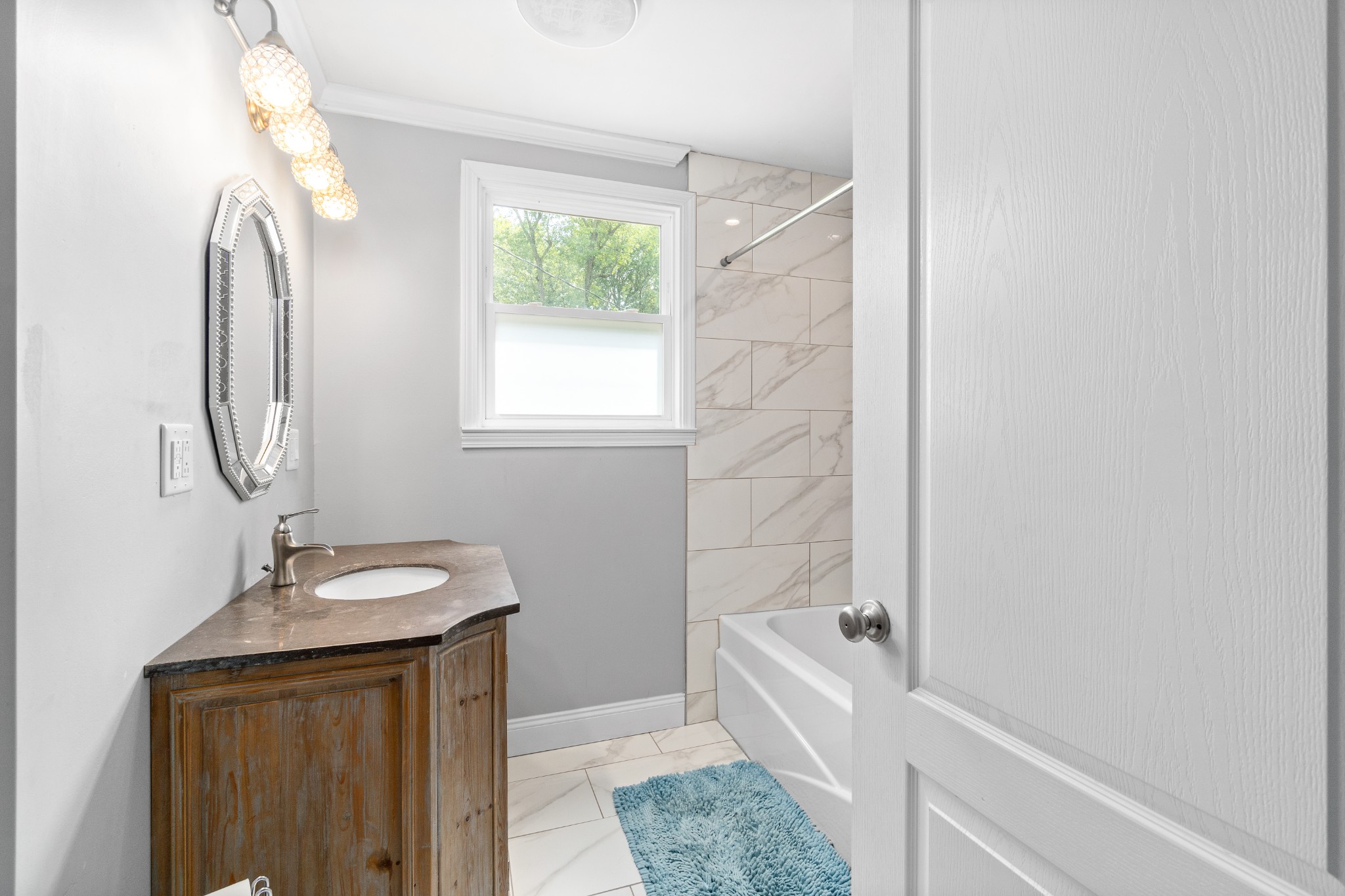 2158 Post Road Clarksville, TN 37043 - Photo 21 of 30 a bathroom with a sink a toilet and tub