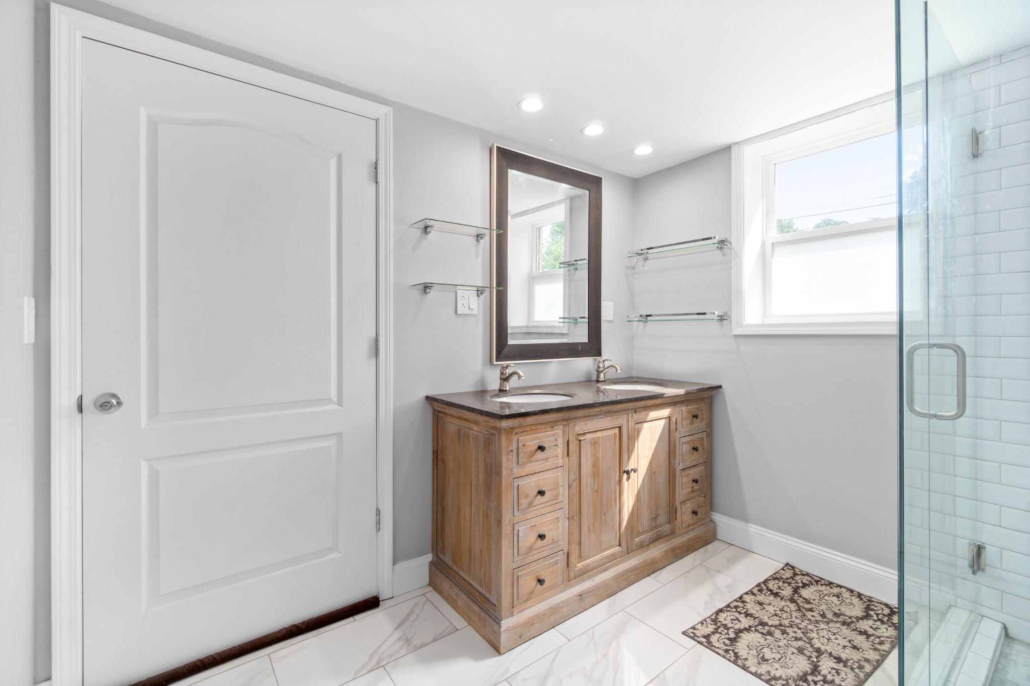 2158 Post Road Clarksville, TN 37043 - Photo 26 of 30 a spacious bathroom with a granite countertop sink a mirror and a