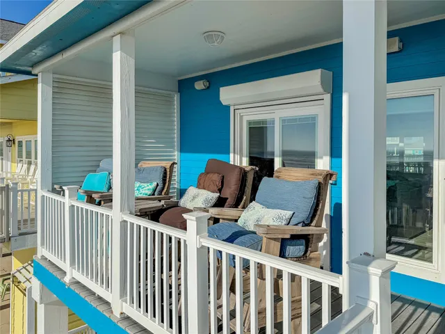 a view of a patio with furniture