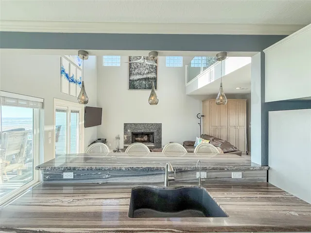 a view of kitchen with furniture and mirror