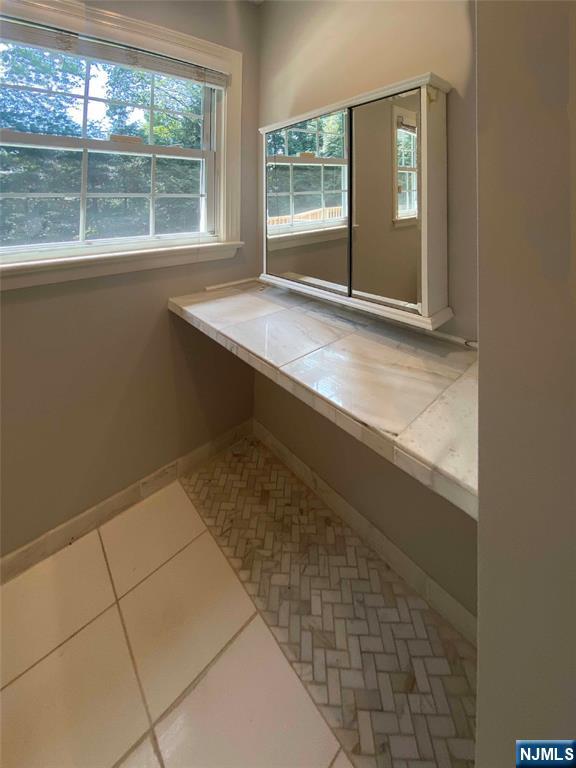 41 Demarest Avenue Demarest, NJ 07627 - Photo 15 of 28 a view of an empty room with a window