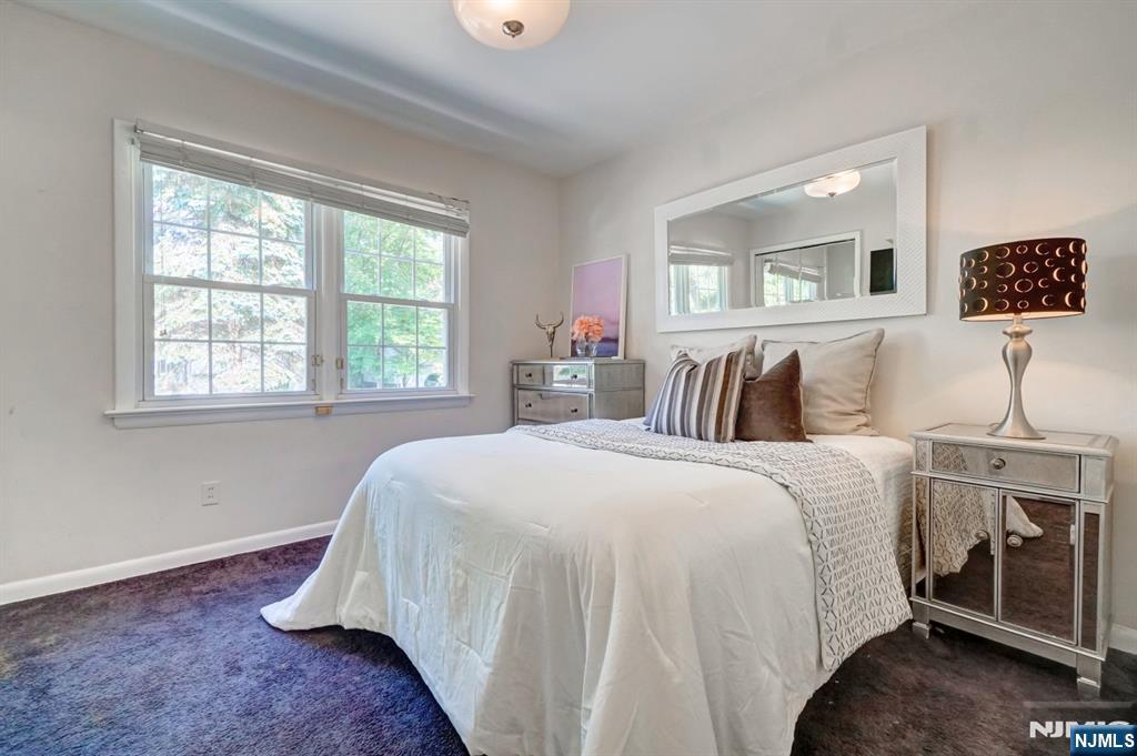 41 Demarest Avenue Demarest, NJ 07627 - Photo 18 of 28 a bedroom with bed and a window