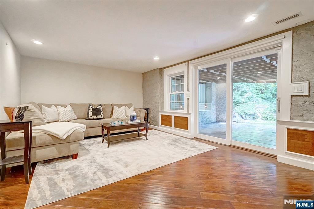 41 Demarest Avenue Demarest, NJ 07627 - Photo 22 of 28 a living room with furniture and a large window
