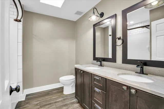 a view of a hall with wooden floor