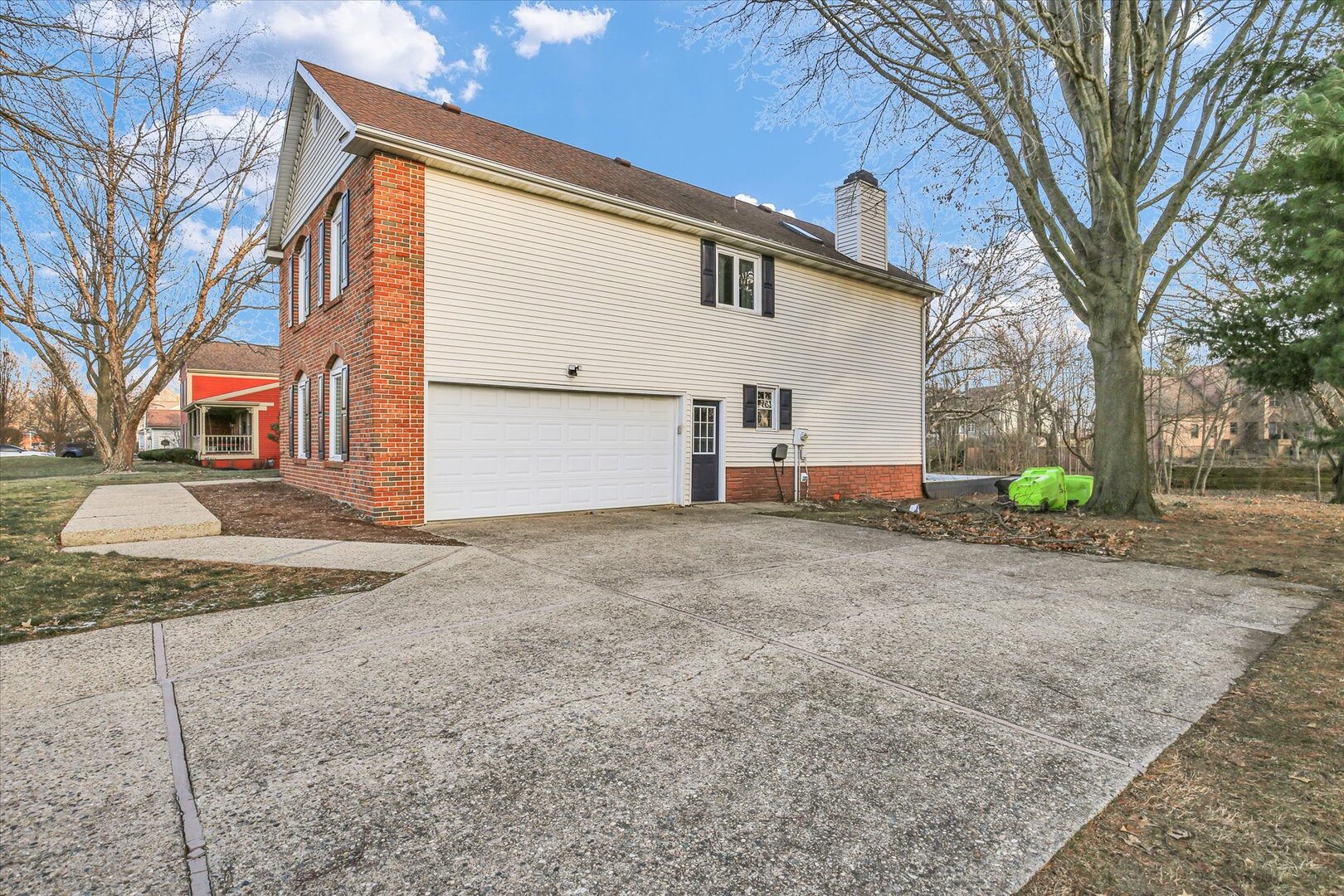 880 Stevens Creek Lane Forsyth, IL 62535 - Photo 47 of 56 a view of a house with a yard and garage