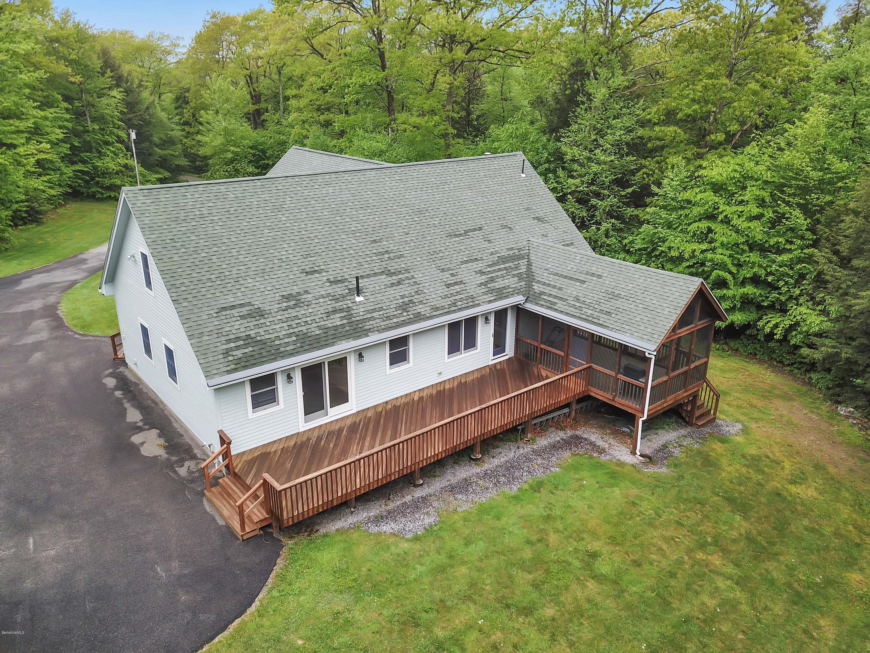 1565 Monterey Road Otis, MA 01253 - Photo 14 of 16 an aerial view of a house with a backyard
