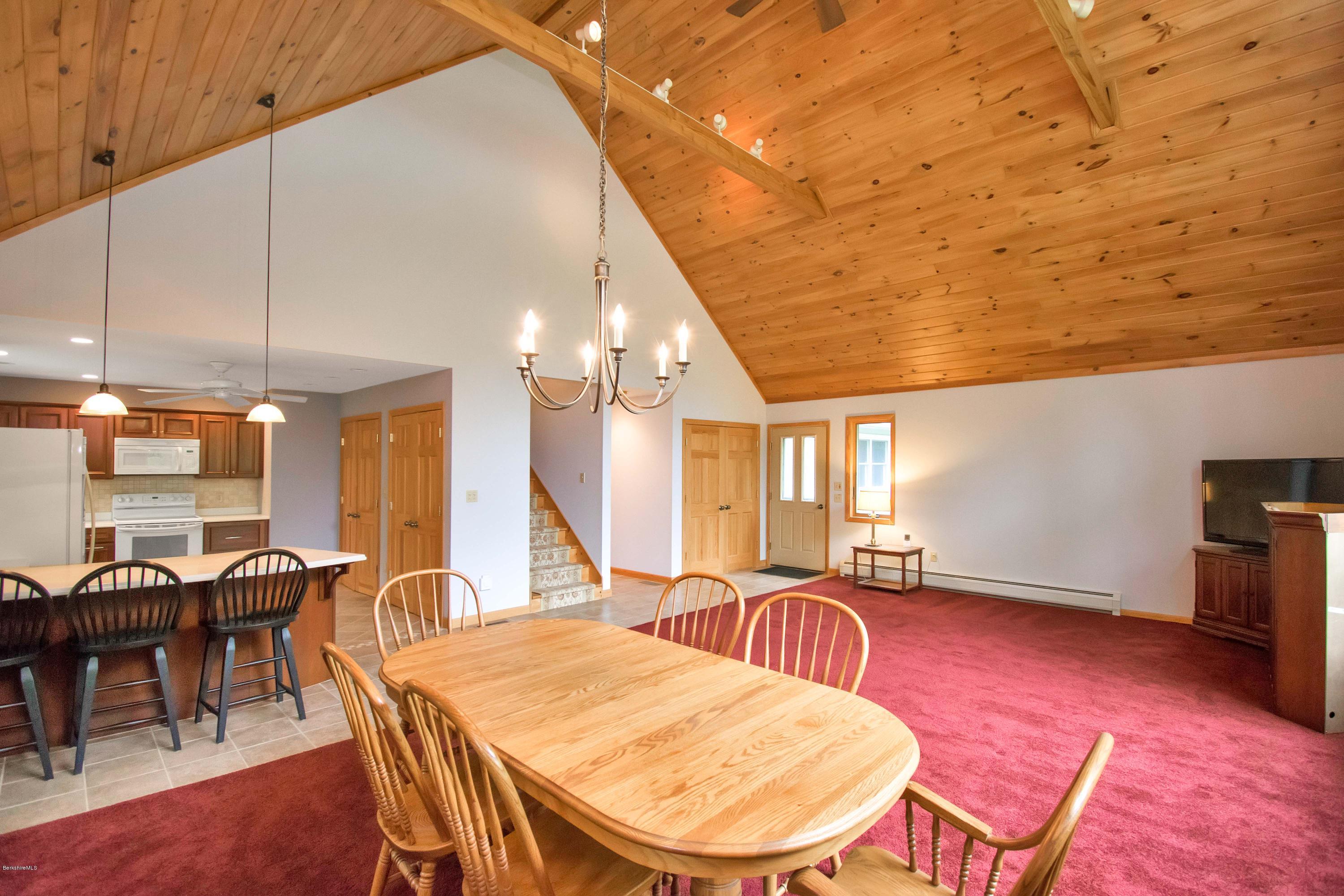 1565 Monterey Road Otis, MA 01253 - Photo 3 of 16 a dining room with furniture and wooden floor