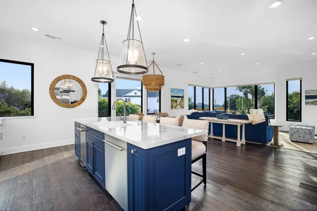 a kitchen with stainless steel appliances a refrigerator and cabinets