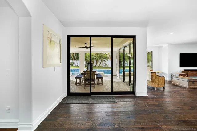 a bathroom with a sink a toilet and a shower curtain