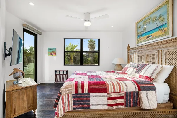 a bathroom with a toilet a sink and a mirror