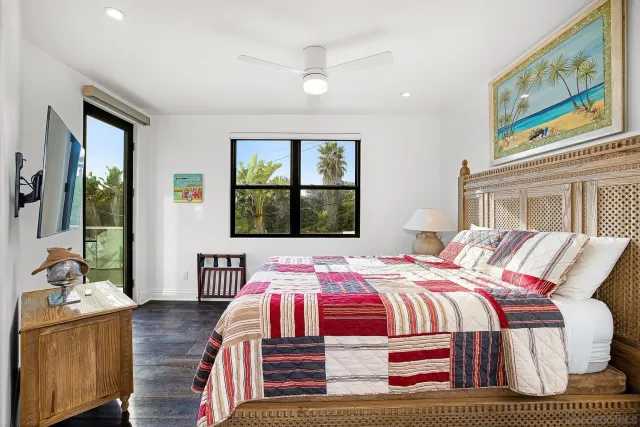 a bathroom with a toilet a sink and a mirror