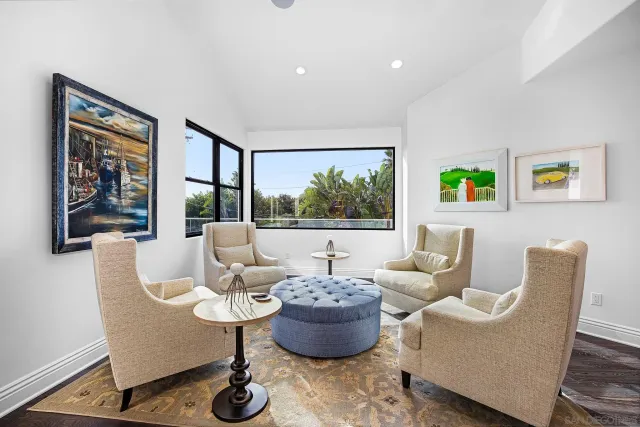 a room with a sink a washer and dryer