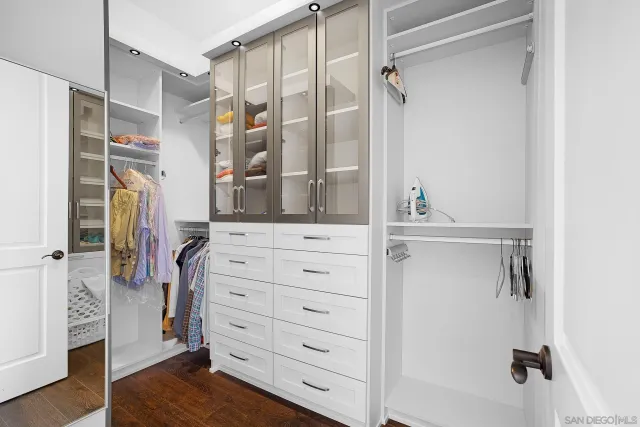 a view of a patio with table and chairs potted plants with wooden floor