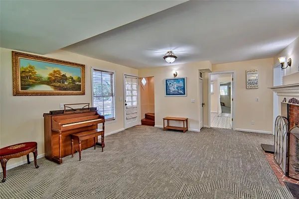 a view of a kitchen area with furniture and window