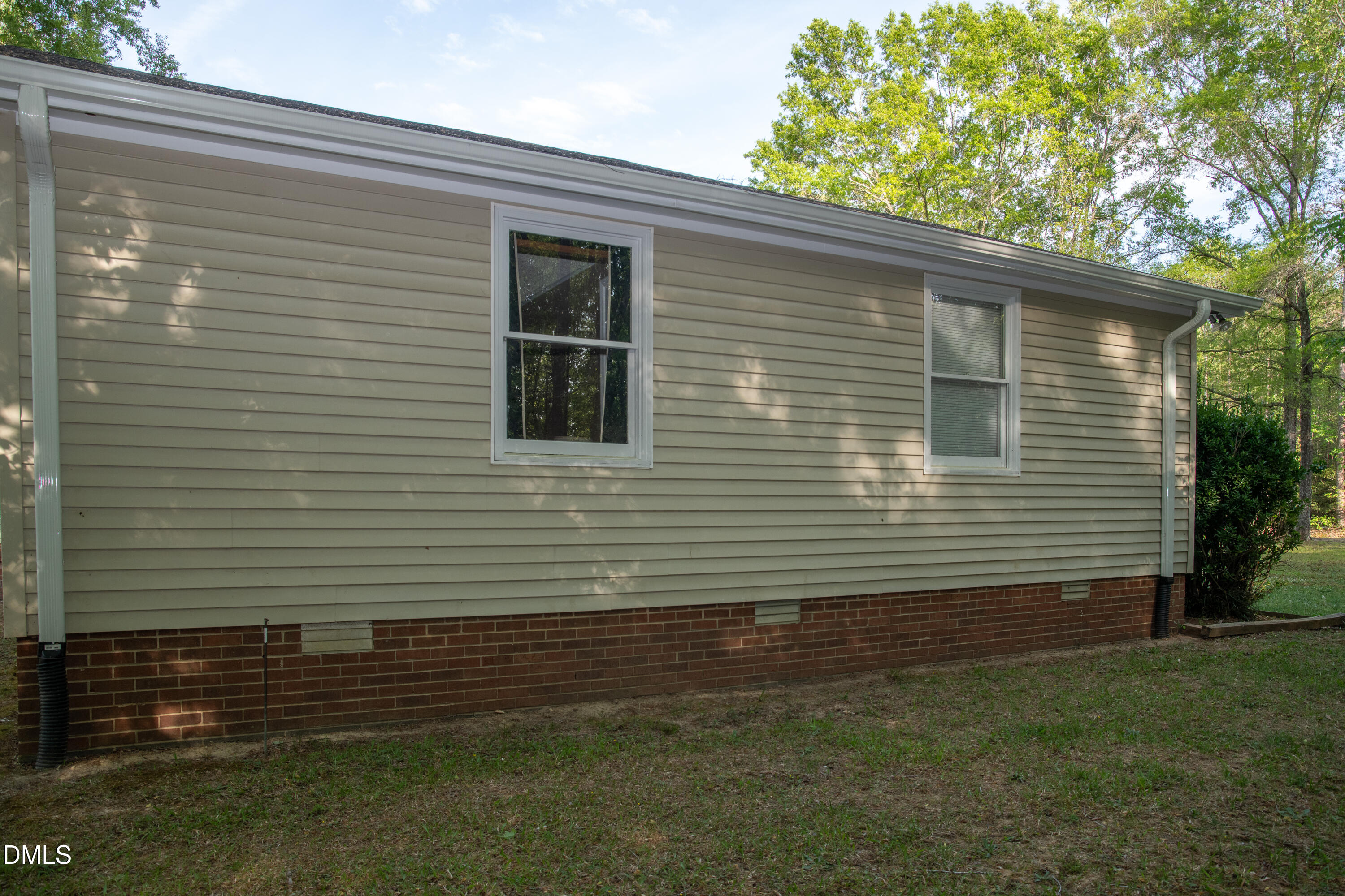 230 Hillsborough Road Timberlake, NC 27583 - Photo 4 of 15 a view of a house with a yard