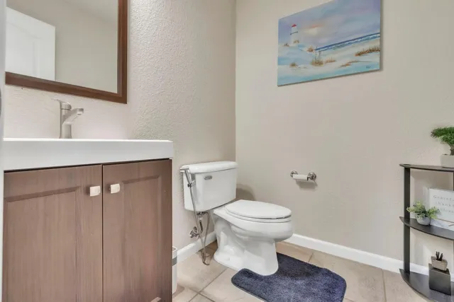 a bathroom with a toilet and a sink