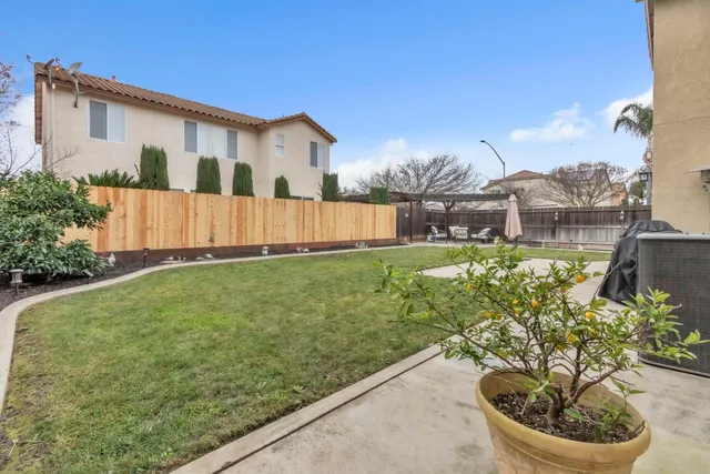 a house view with a garden space