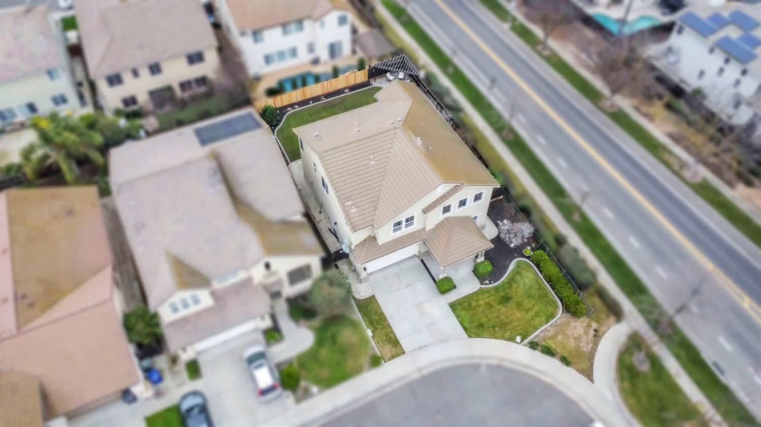 2993 Essie Place Modesto, CA 95355 - Photo 43 of 44 an aerial view of a house a swimming pool and outdoor seating