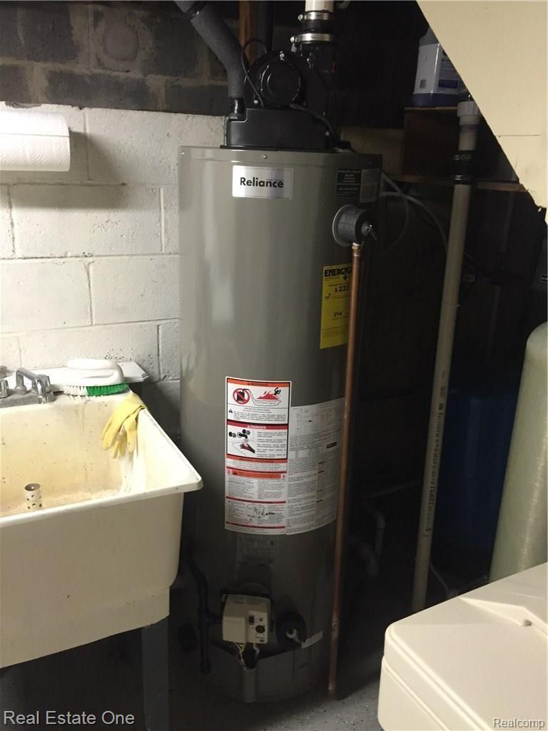 679 West Baker Road Highland, MI 48357 - Photo 30 of 39 H/W Heater & Utility Sink
