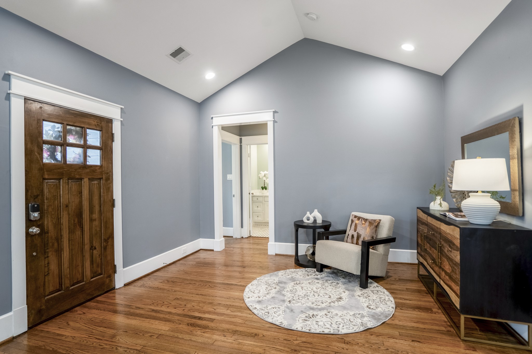 823 East 27th Street Houston, TX 77009 - Photo 11 of 49 a living room with couch chairs and a wooden floor