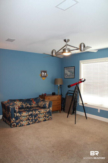 5375 Greentree Road Orange Beach, AL 36561 - Photo 15 of 25 Upstairs bedroom en suite bath and walk-in closet. Additional attic room off of closet!