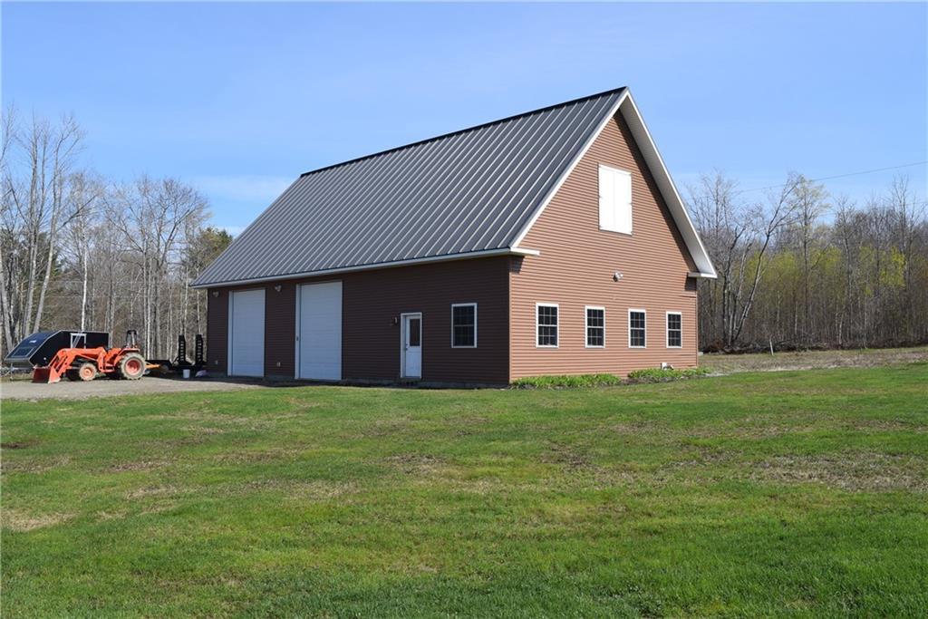 84 Kennard Road Newburgh, ME 04444 - Photo 8 of 35 Spacious garage, metal roofing,...