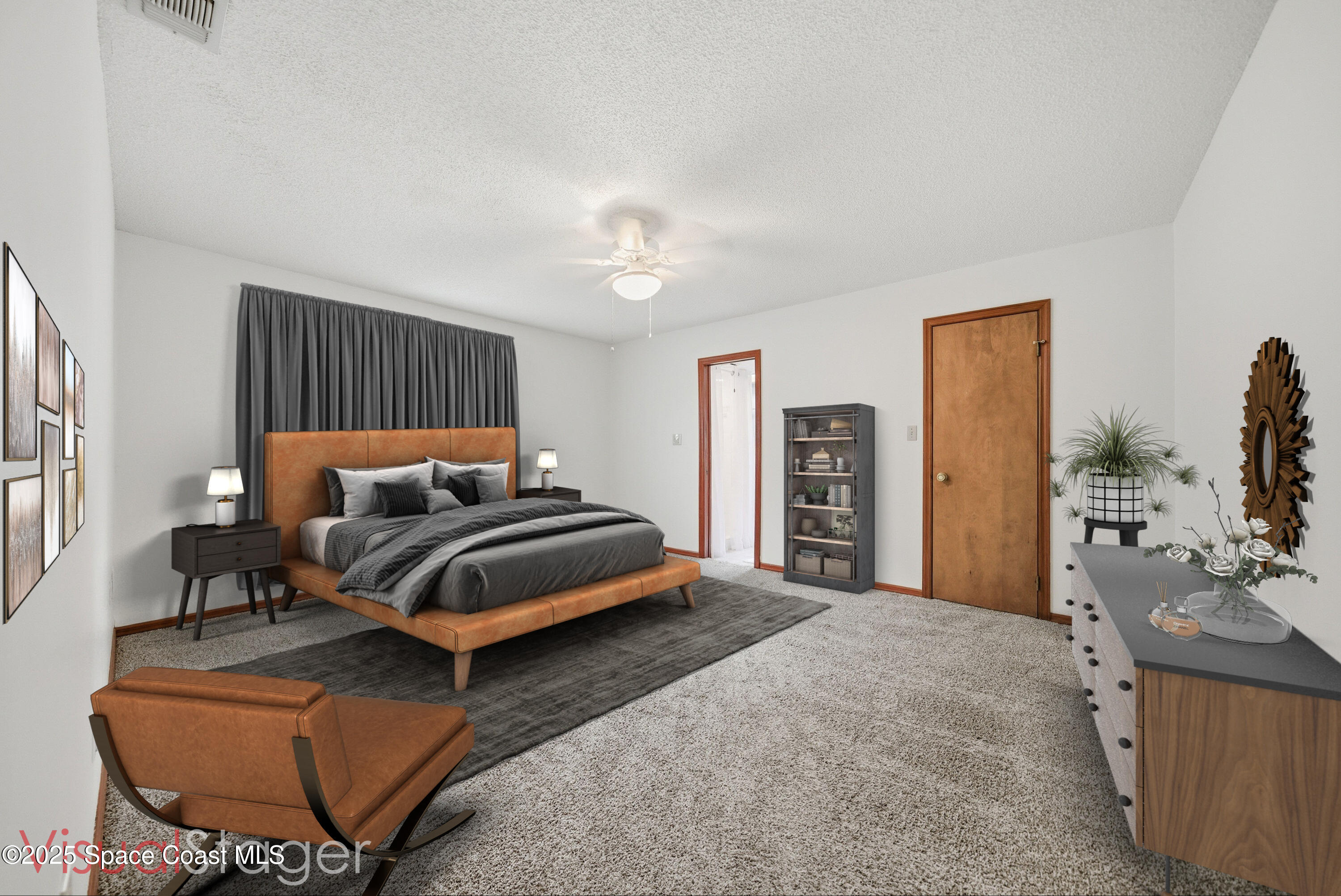 2108 Rosewood Drive Melbourne Beach, FL 32951 - Photo 12 of 39 a bedroom with furniture and a chandelier