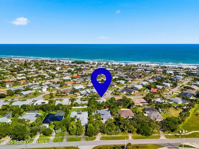 a view of backyard with green space