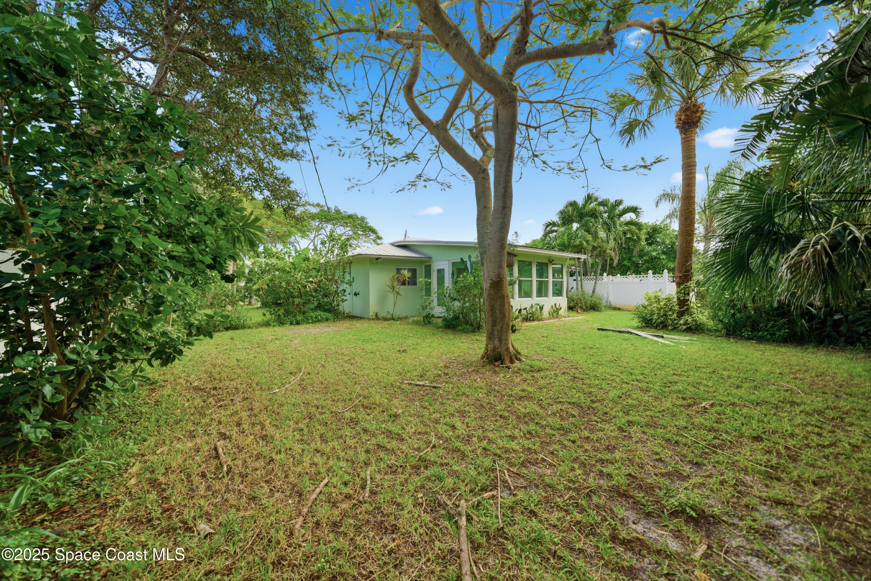 2108 Rosewood Drive Melbourne Beach, FL 32951 - Photo 28 of 39 a view of a backyard