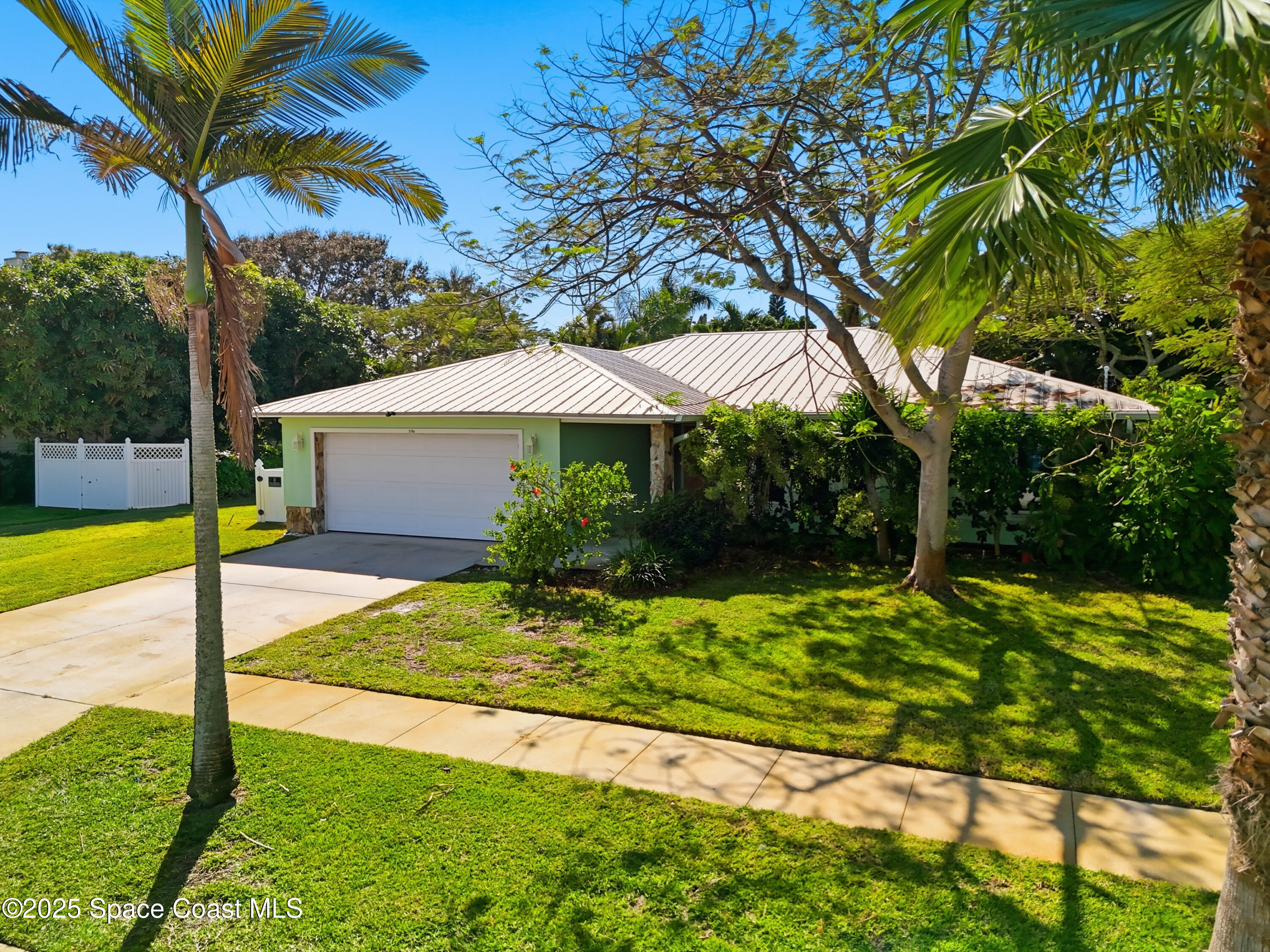 2108 Rosewood Drive Melbourne Beach, FL 32951 - Photo 35 of 39 a view of a house with swimming pool