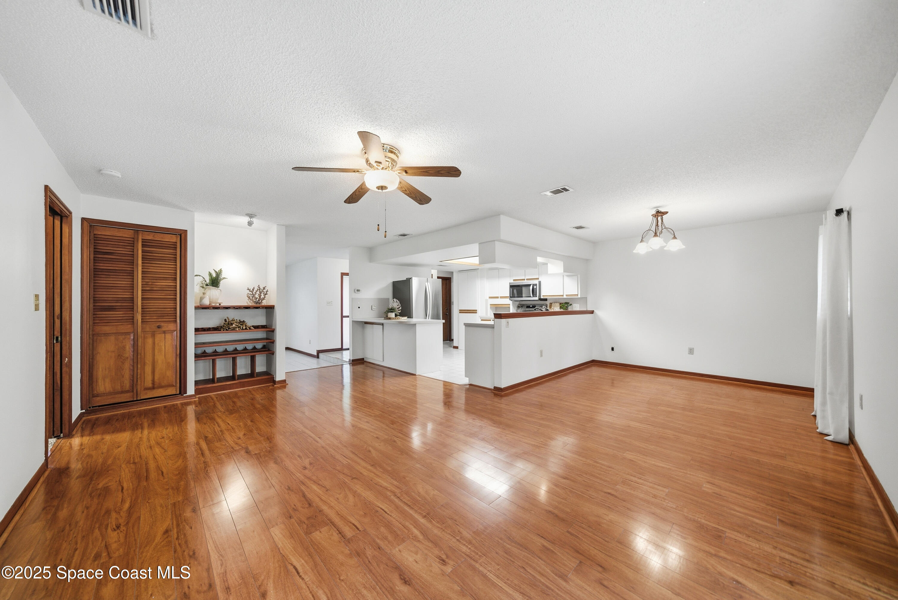 2108 Rosewood Drive Melbourne Beach, FL 32951 - Photo 9 of 39 a view of a kitchen with a sink and a kitchen view